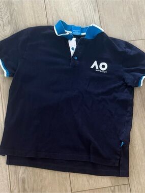 Womens Navy Polo with Blue Trim from Australian open sz large runs small fits m